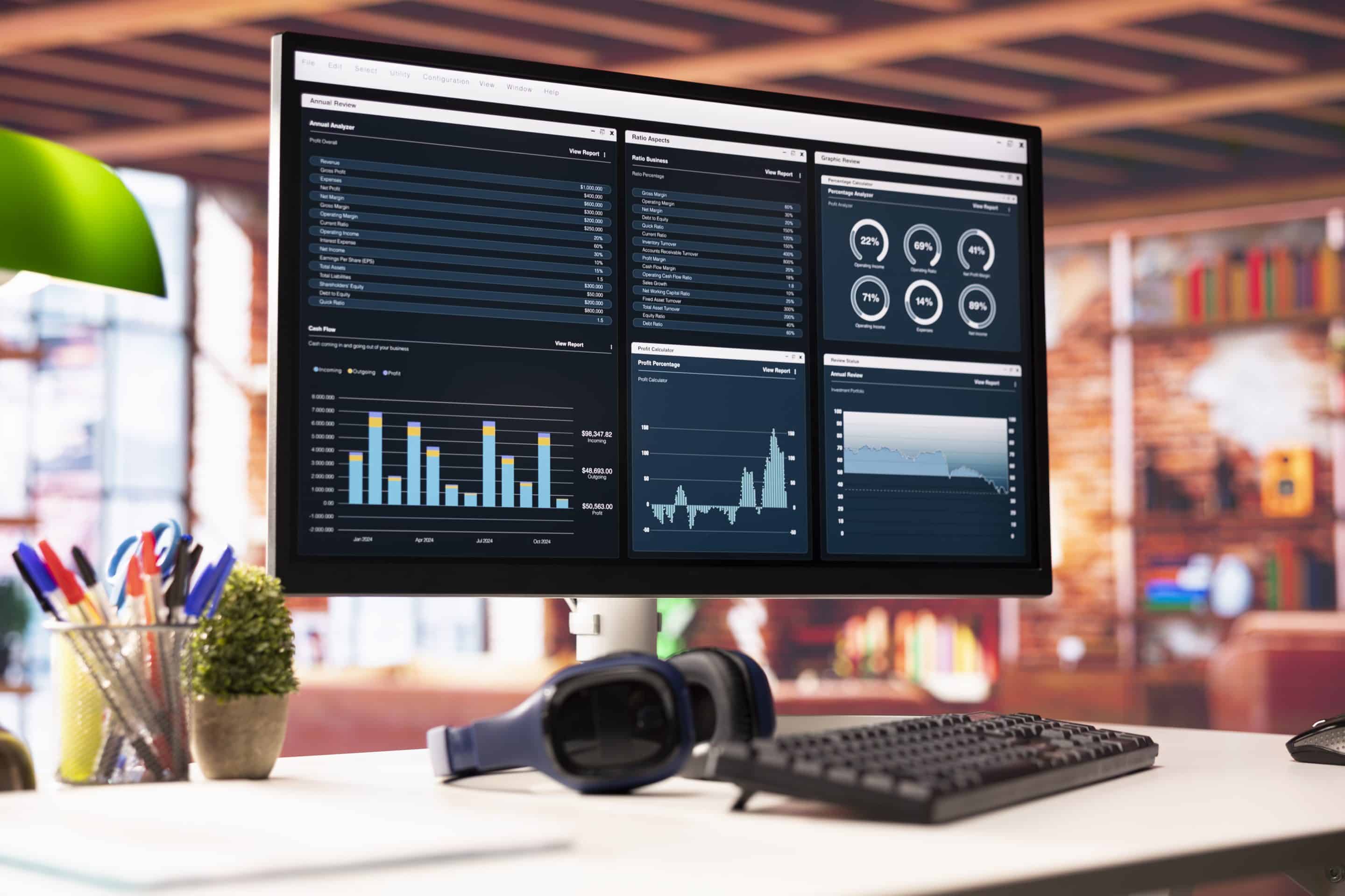 Fusion Practices Whitepaper Featured Image - AI Reporting - Woman using her computer at work